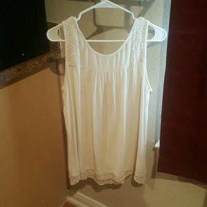 Shirt  is large and selling for 14$ hardly worn